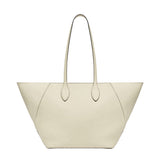 Front open side view of white valextra's small vivi shopping bag on white background, with no model shown.