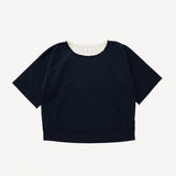 Front view of navy burrow dual sweat top on white background, with no model shown.