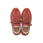 Overhead view of red fkt runner sneaker on white background, with no model shown.