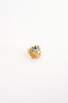 alt="Polly Wales Rainbow Sapphire Shield Ring at A'maree's"