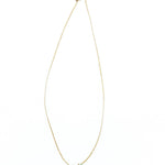 Pippa-Small-18K-yellow-gold-blue-topaz-collette-pendant-on-cord-amarees